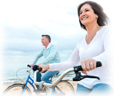 Couple Biking on Beach
